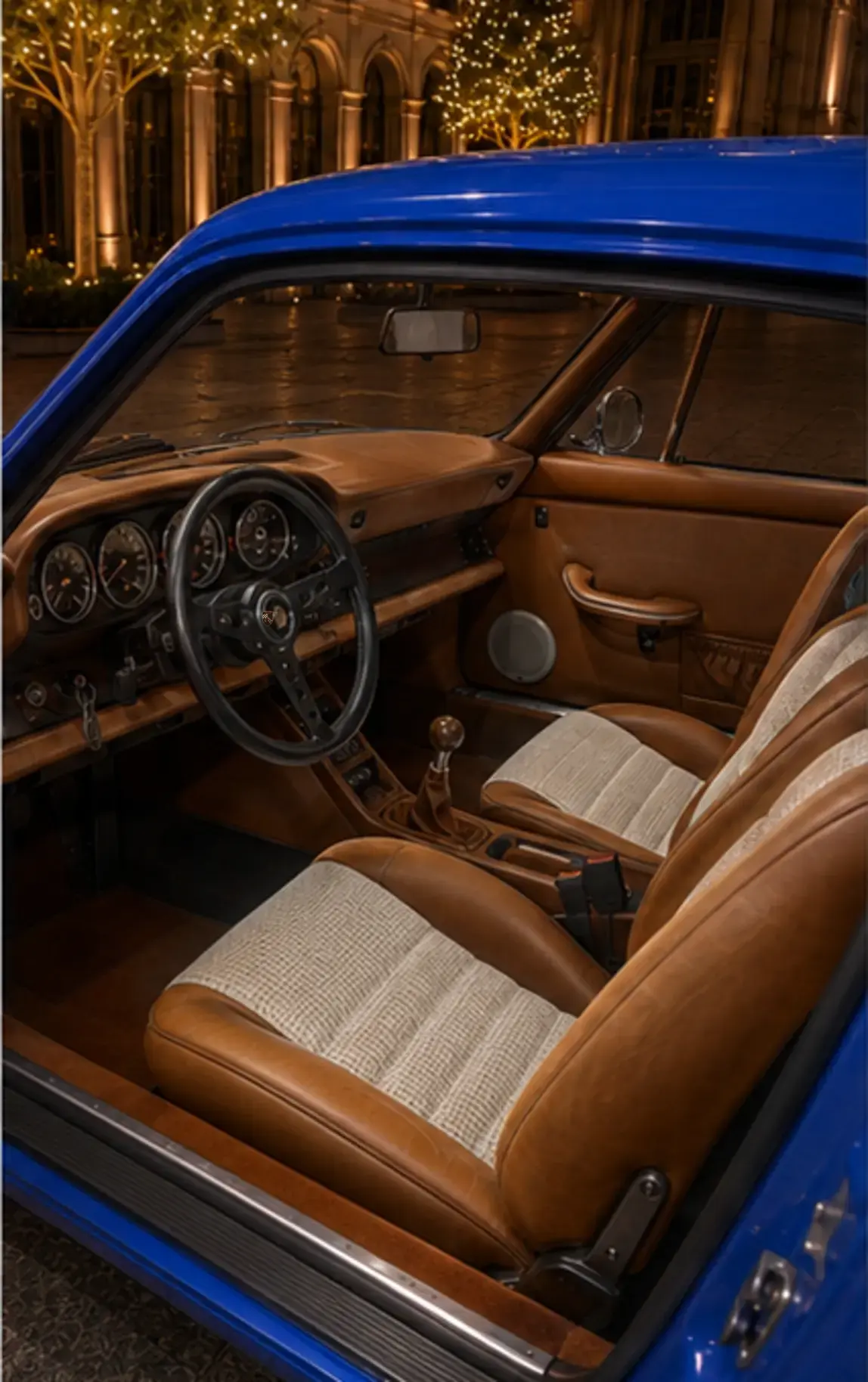 The same open-door Sooner cabin resolved in cognac leather and woven cloth