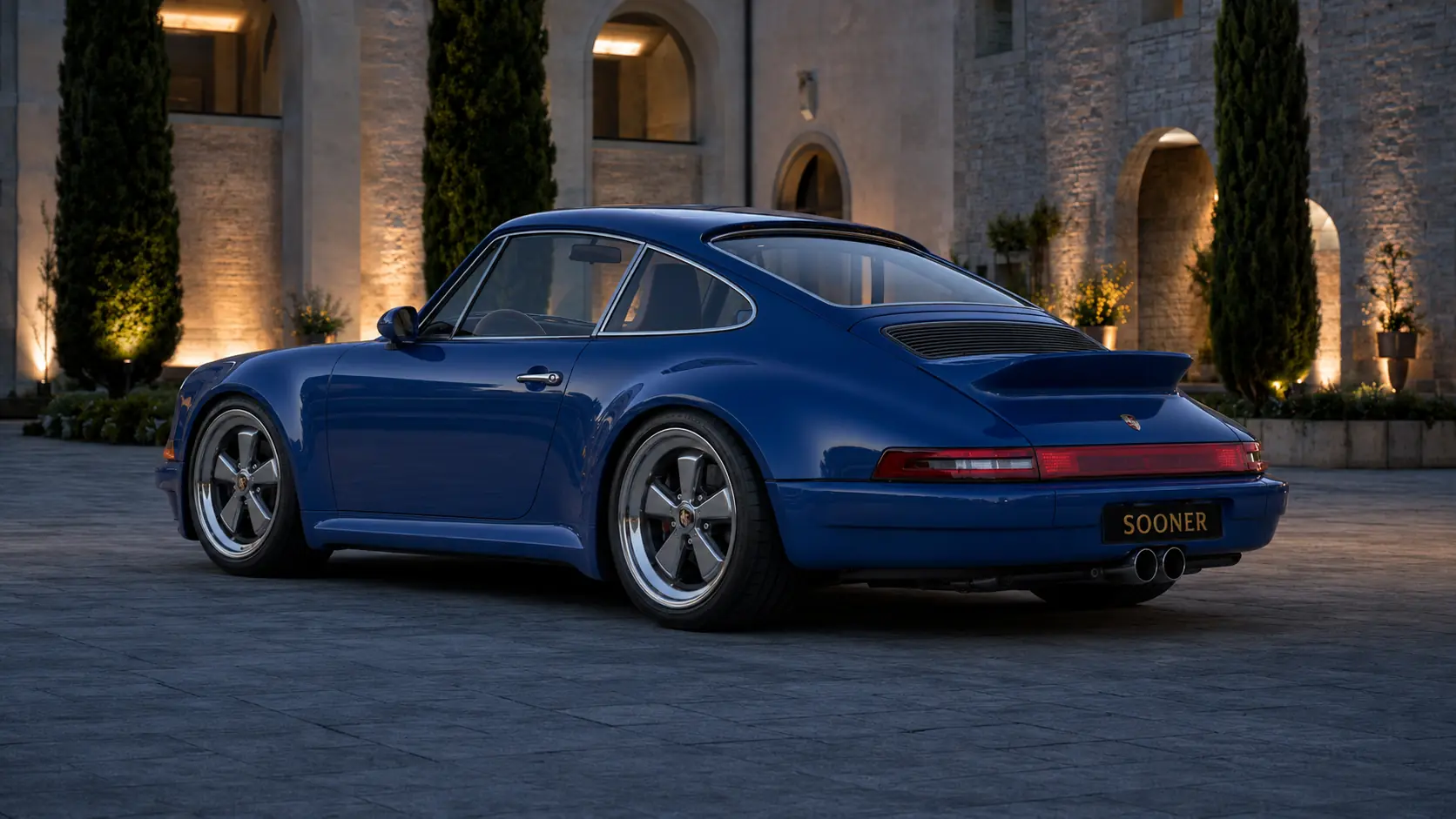 Dark-blue Sooner rear study with ducktail and six-spoke wheels